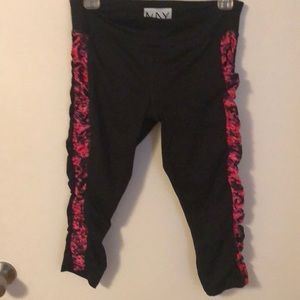 Black with pink rouching detail on side capris
